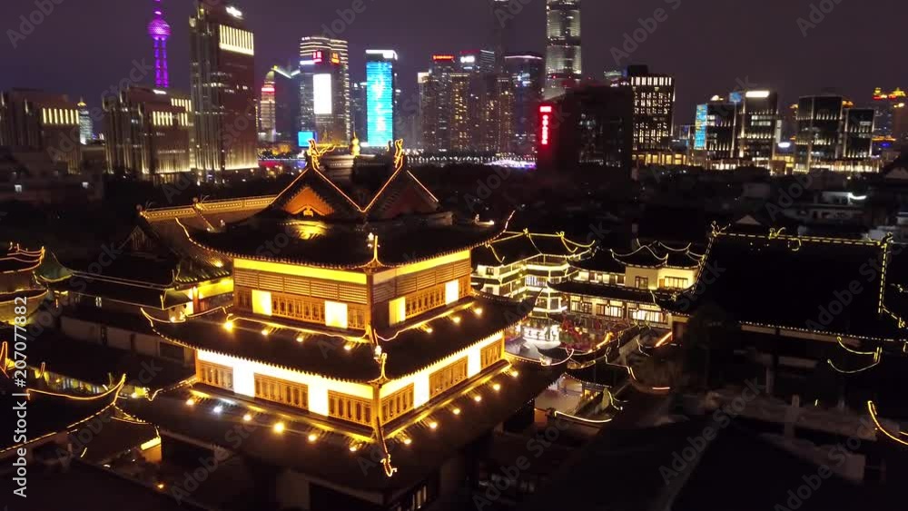 Unique Aerial Around Night illumination Yuyuan Garden Shanghai historical authentic style culture tile roofs Contrast Skyscrapers Pudong Pearl modern colorful glass structure people Travel showplace Unique Aerial Around Night illumination Yuyuan Garden Shanghai historical authentic style culture tile roofs Contrast Skyscrapers Pudong Pearl modern colorful glass structure people Travel showplace