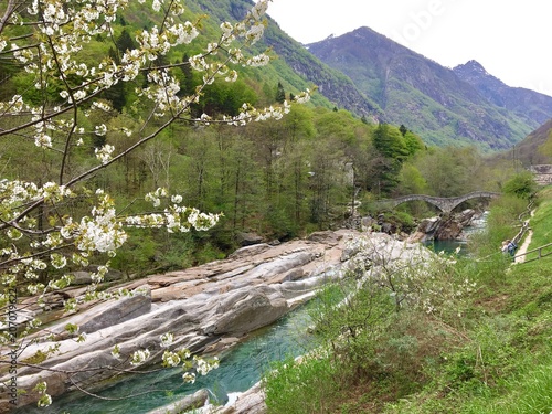 fluss in lovarzetta mit brücke ponte dei salti in Tessin photo