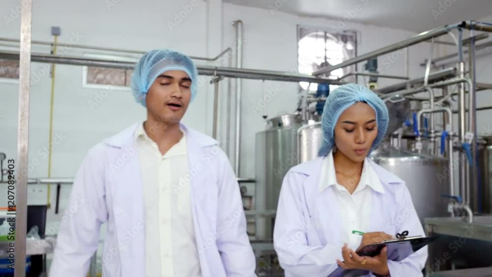 People work at factory. Food production, industry and people concept People work at factory. Food production, industry and people concept