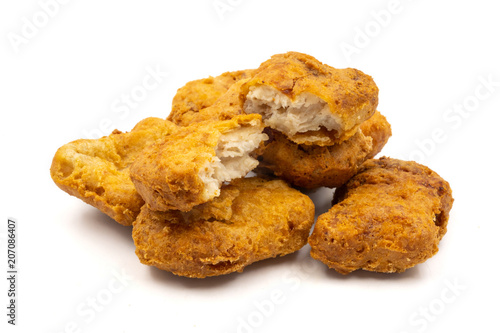 Chicken nuggets on a white background.