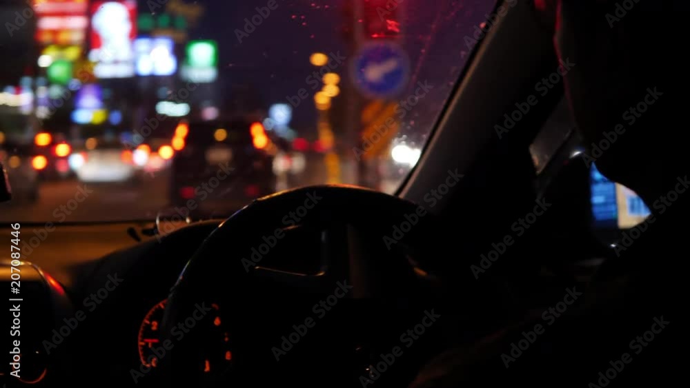 car driving in night city with traffic jam car driving in night city with traffic jam