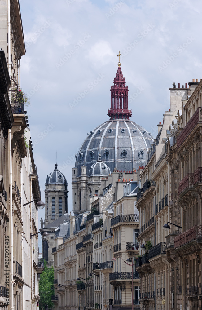 Madeleine Church dome and parisian building facades
