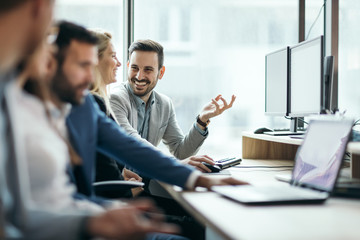 Picture of business people working together in office