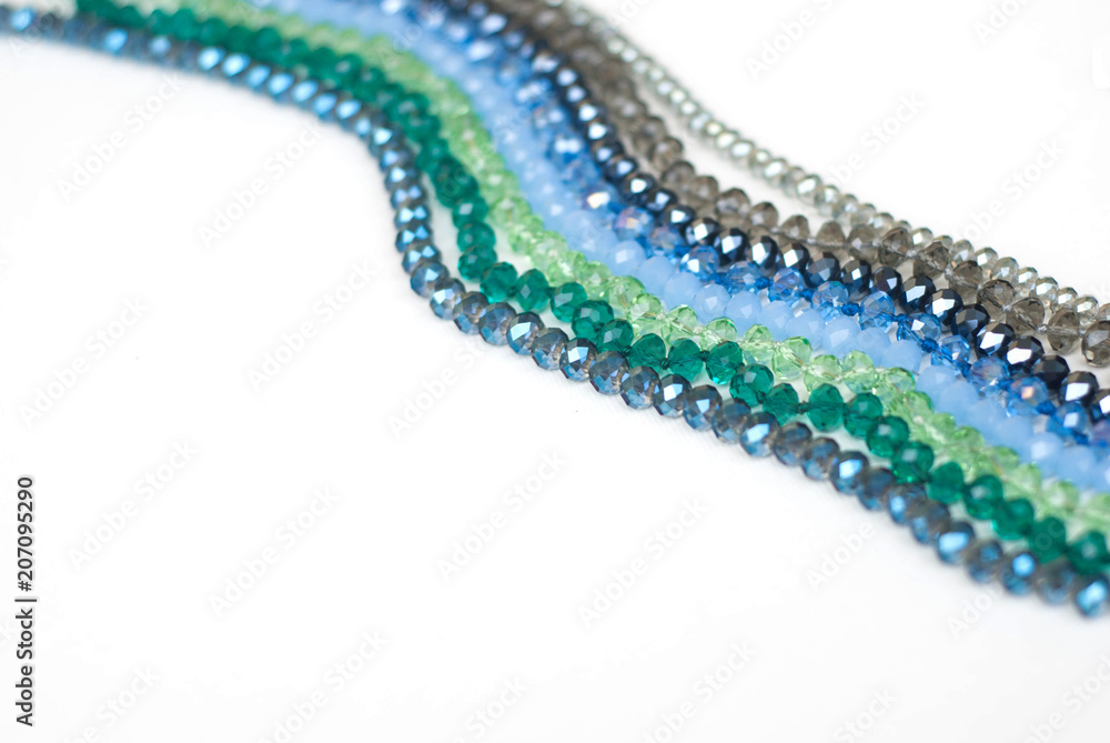 Obraz premium Colorful Shinny Crystal Beads Glass Isoalted on White Background Copy space for Text Fashion Beauty