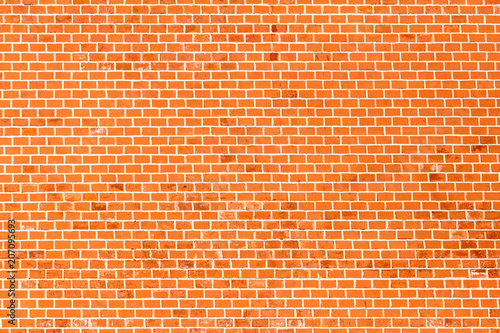 Wall of red bricks as an abstract background