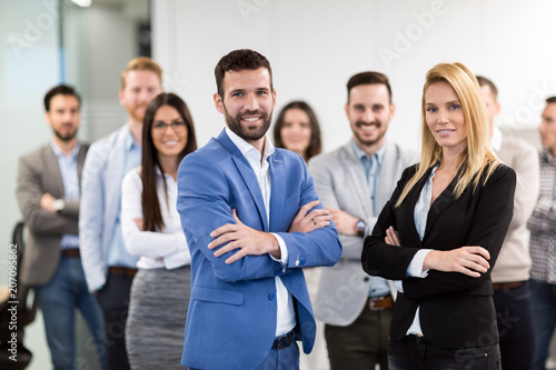 Portrait of business team posing in office