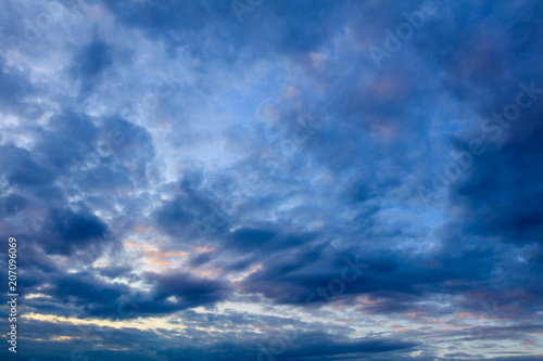 Clouds on a blue sky as a background