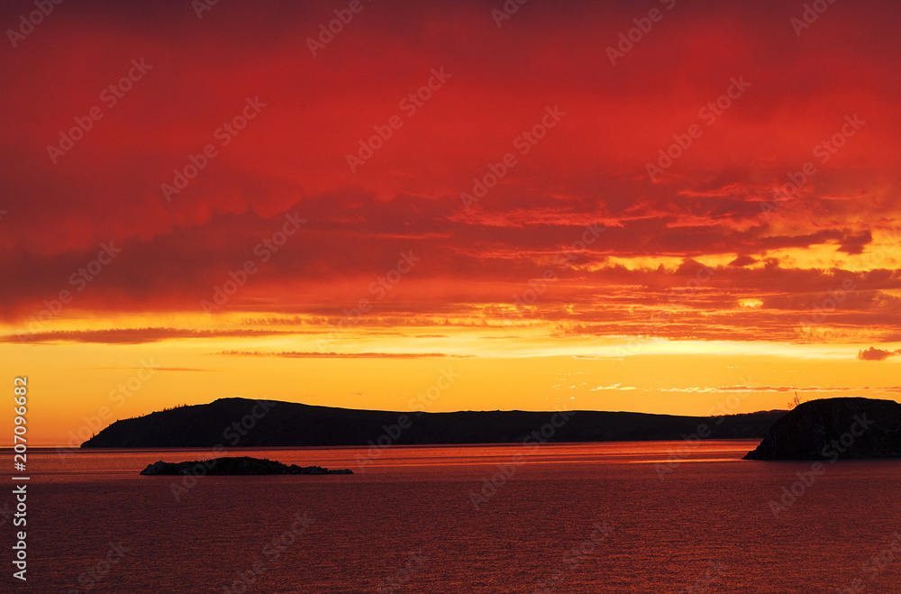 red sunset at the sea, red sun, fiery sky,
sea ​​sunset