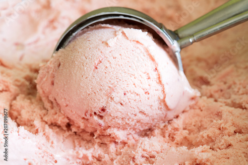 Strawberry scoop ice cream background concept closeup
