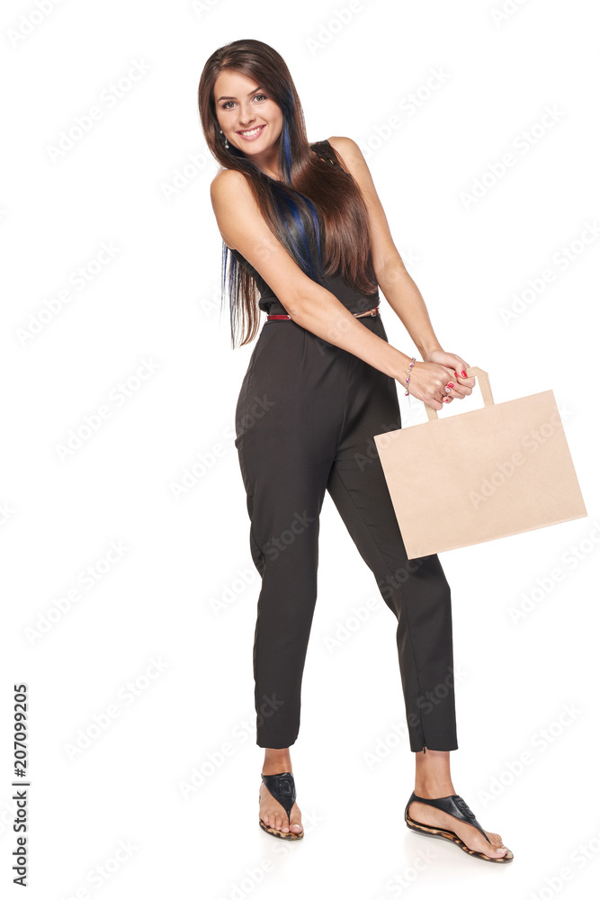 Full length woman carrying a carton brown shopping bag with empty copy space Full length woman carrying a carton brown shopping bag with empty copy space
