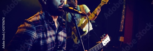 Photography Male guitarists on stage in nightclub