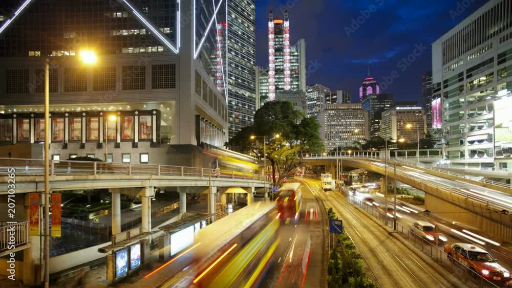 Vehicles moving along the Queensway in Central, Hong Kong, China, T/lapse Vehicles moving along the Queensway in Central, Hong Kong, China, T/lapse