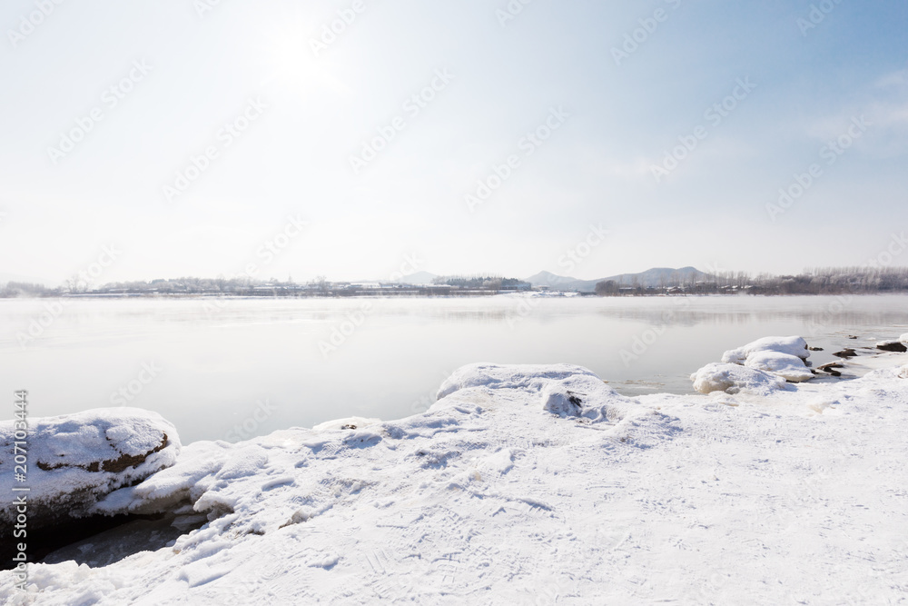 a scenic cold winter landscape with snow and trees a scenic cold winter landscape with snow and trees