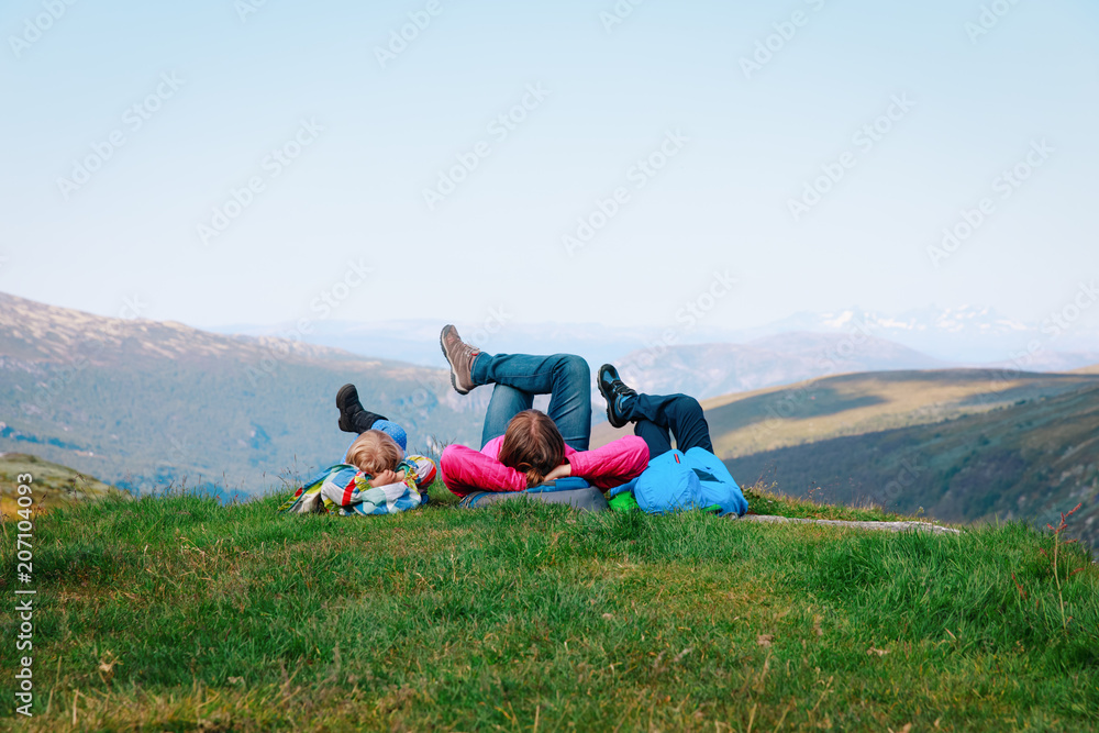 family- mother and kids relax in mountains, nature travel