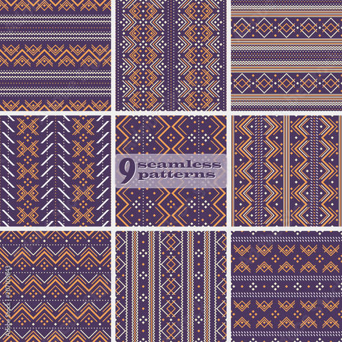 Set of seamless geometric folk style patterns violet and orange colors