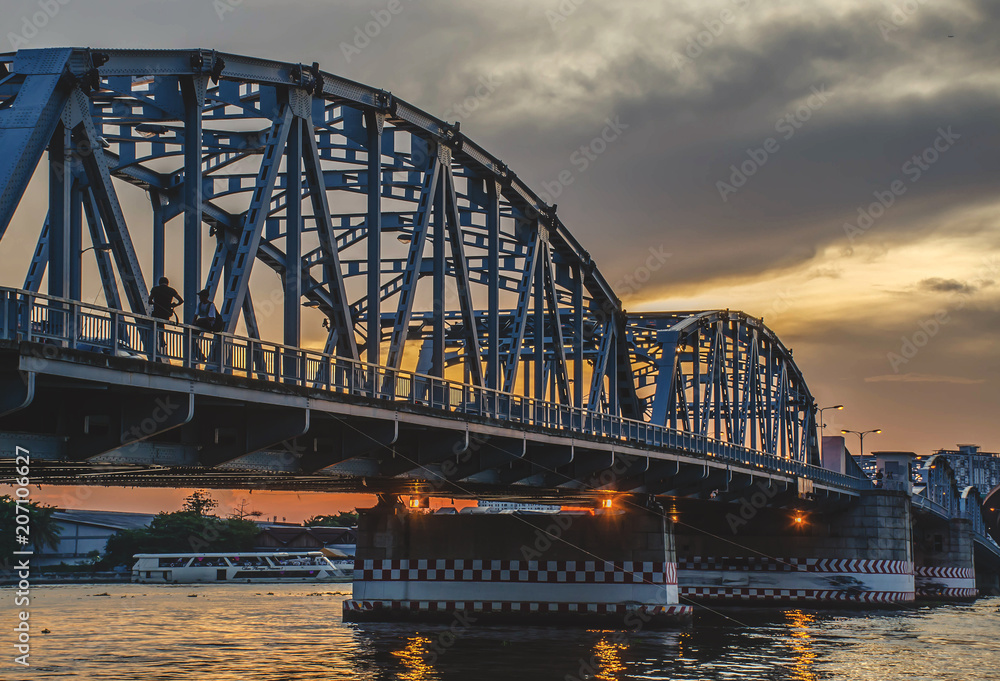 Krungthep - Rama III Bridge A bridge across the Chao Phraya River Between  Ratchadapisek Road and Somdej Taksin Road in sunset ,Thon Buri in Bangkok  Thailand. Stock Photo | Adobe Stock