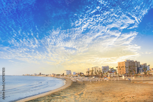 Beautiful view of the main street of Larnaca and Phinikoudes beach in Cyprus photo