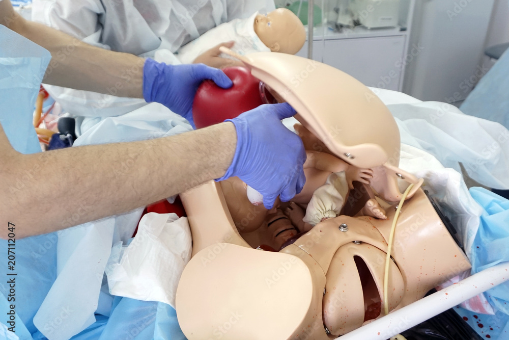 Simulation mannequin for childbirth during training for obstetricians. Simulation mannequin for childbirth during training for obstetricians.