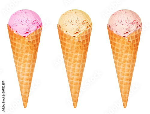 Different tastes of ice cream in a cone waffle. Isolated on white background. Strawberry, vanilla, caramel ice cream.