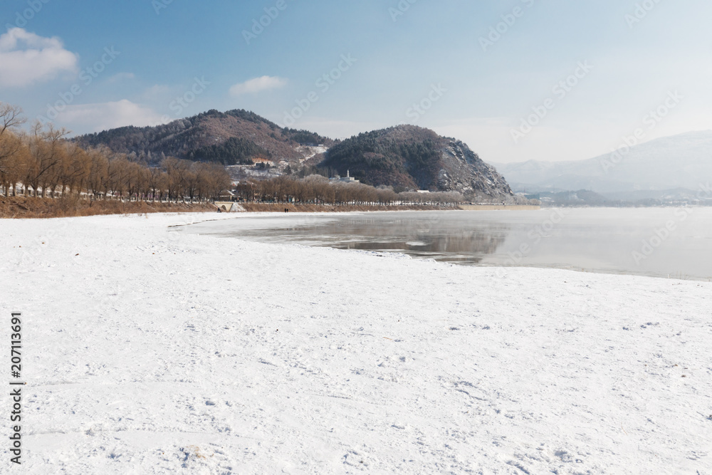 a scenic cold winter landscape with snow and trees a scenic cold winter landscape with snow and trees