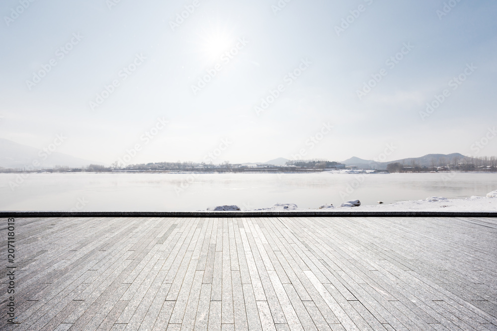 Naklejka premium Panoramic skyline with empty concrete square floor