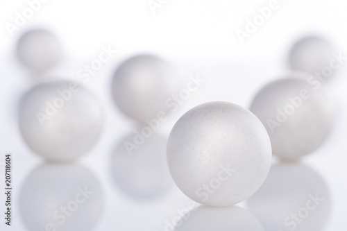 scattered pearl pearls on a white background