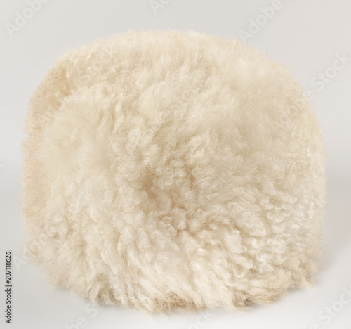 White caucasian papakha, of sheepskin, on white background