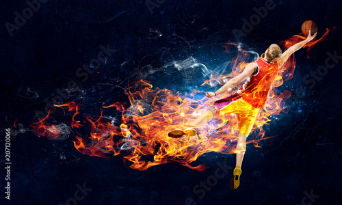 Basketball Player on Fire © Sergey Nivens