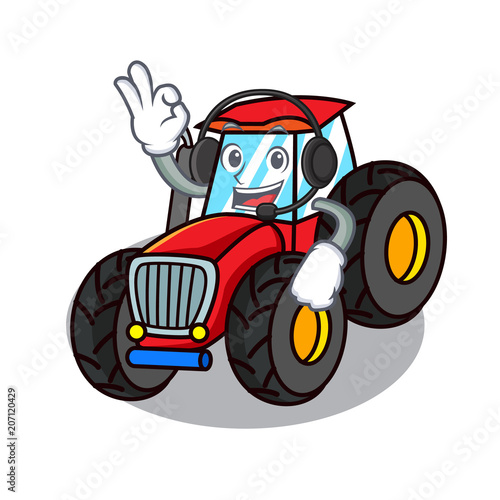 With headphone tractor mascot cartoon style photo