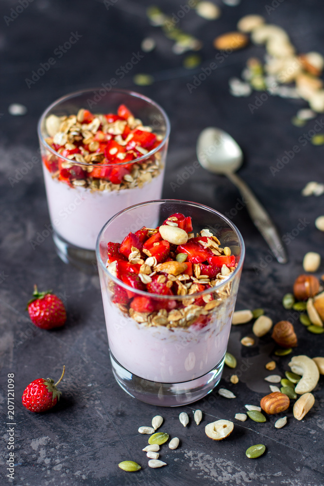 Granola with yogurt, strawberry and nuts, healthy breakfast Granola with yogurt, strawberry and nuts, healthy breakfast