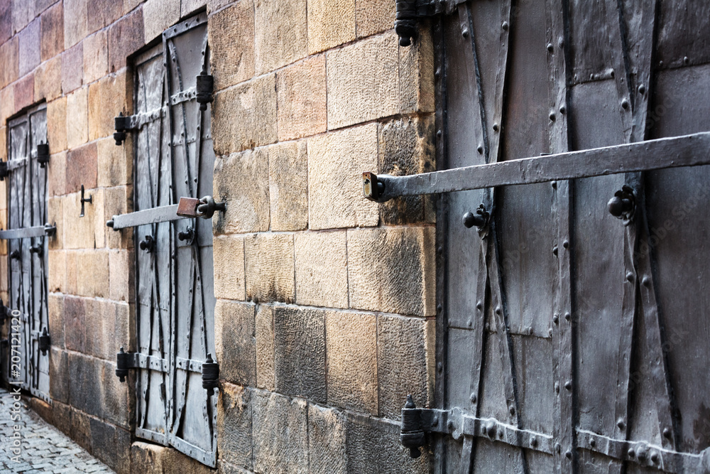 windows closed with iron shutters windows closed with iron shutters