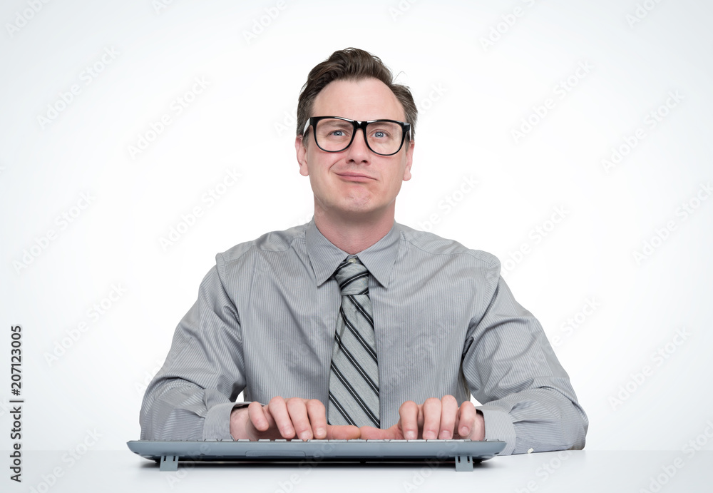 Man in glasses works at the computer on background Man in glasses works at the computer on background