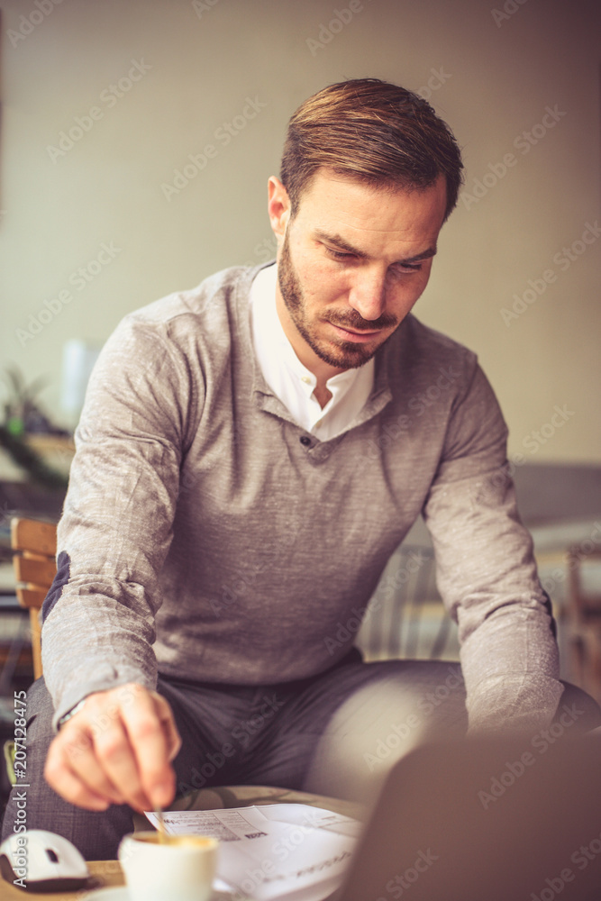 Young businessmen at his office. Young businessmen at his office.