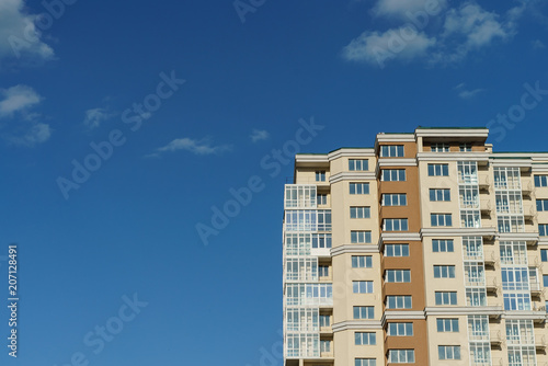 Multi-storey house and blue sky