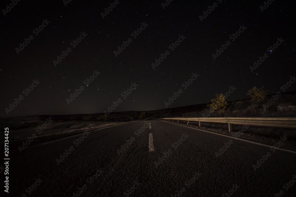 An isolated road with starry sky
