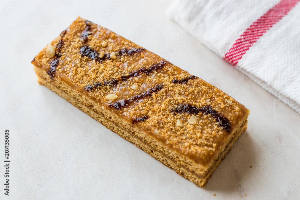Honey Flavored Energy Bar with Walnut, Milk and Caramel Sauce Honey Flavored Energy Bar with Walnut, Milk and Caramel Sauce