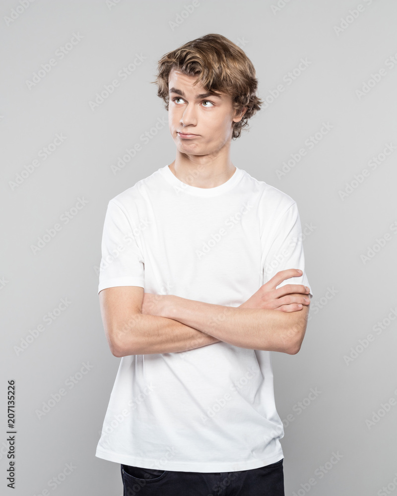 Young man making a decision Young man making a decision