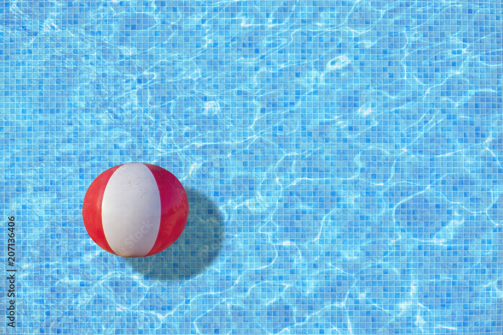 Ball in turquoise mosaic pool concept for playtime, back to work, school start for example.