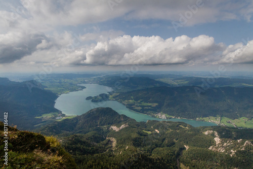Panoramic view of mountains from Schafberg peak in Salzkammergut, Austria in a beautiful summer day