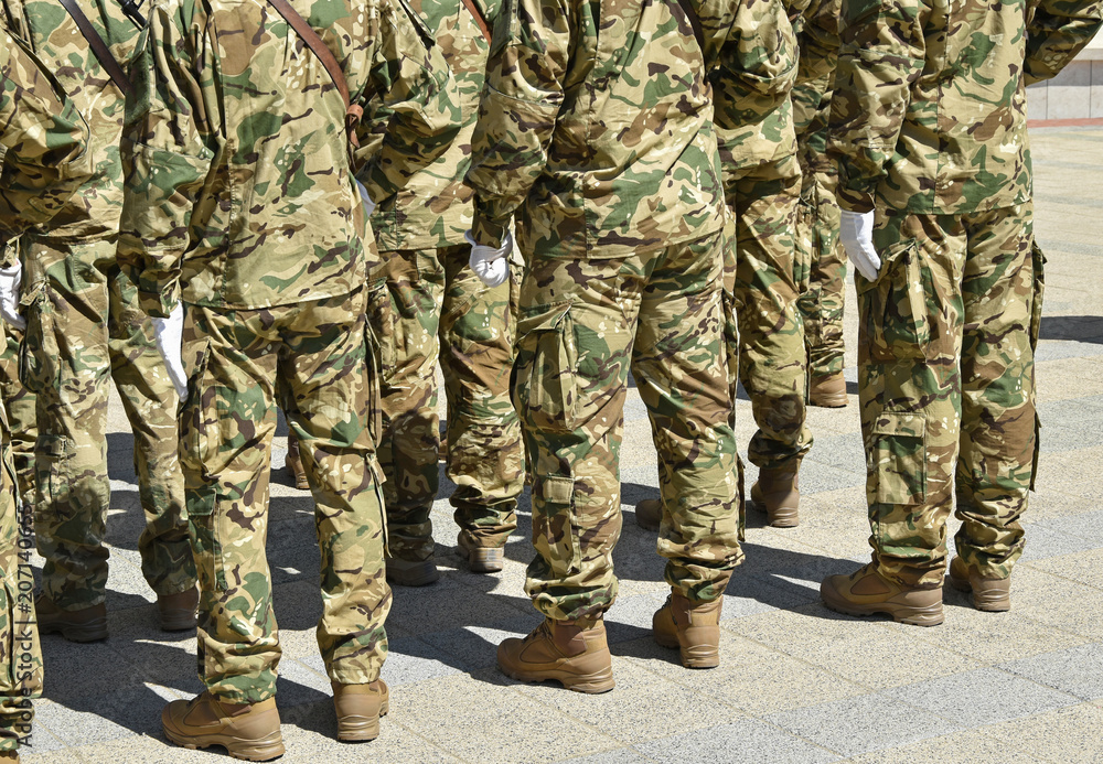 Soldiers standing in a row at the military parade. Soldiers standing in a row at the military parade.