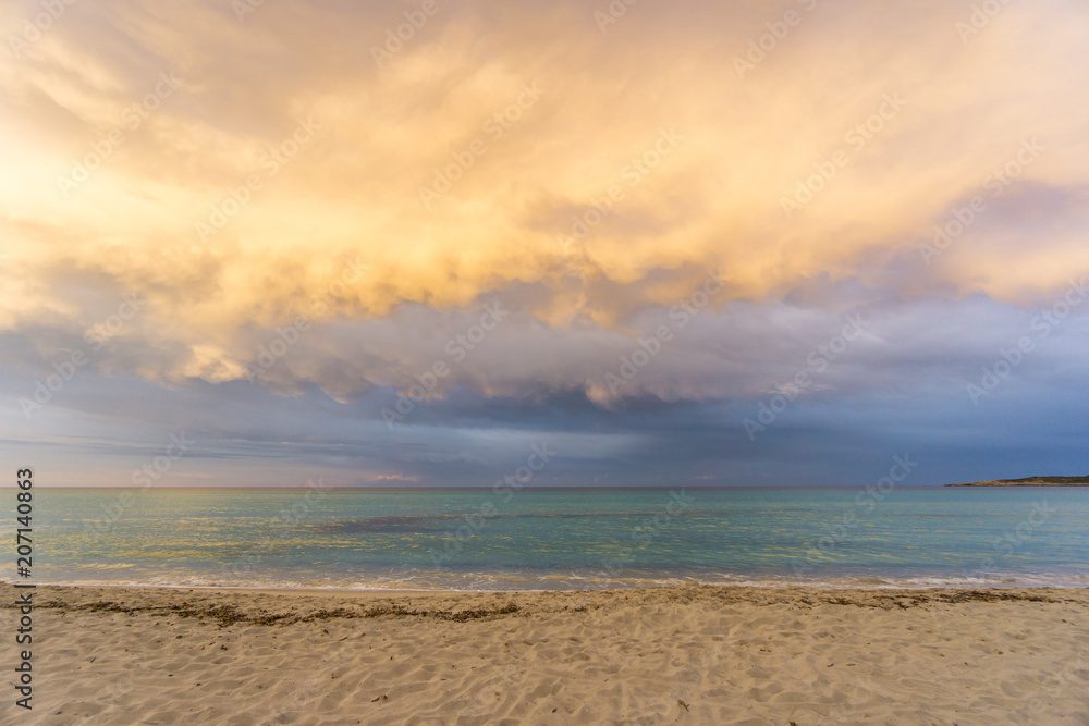 Mallorca, Stormy shiny sky cloudscape at dawn at beach
