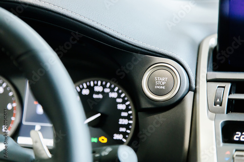 Engine start button on the dashboard of the car © Татьяна Скорина