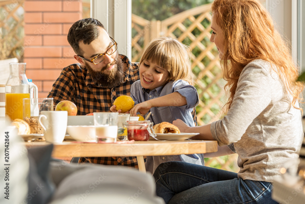 Lovely family eating breakfast Lovely family eating breakfast