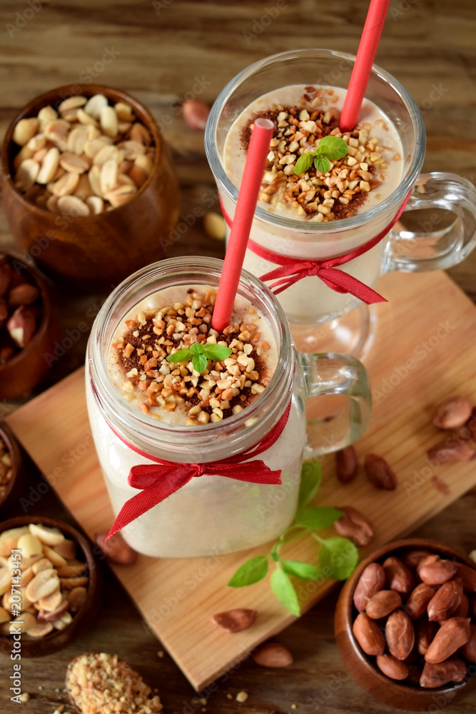 Protein cocktail with peanuts in a glass jar
