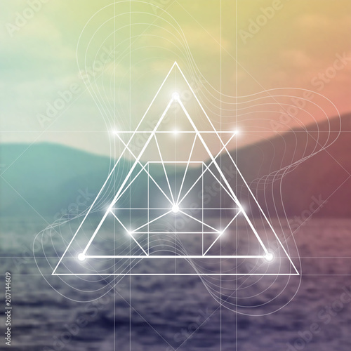 Interlocking circles and triangles hipster sacred geometry illustration with golden ratio digits in front of photographic background.