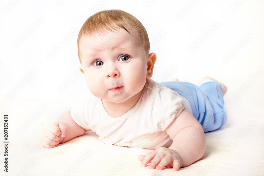 baby lying on his stomach baby lying on his stomach