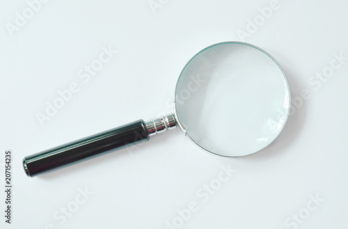 magnifying glass with black handle on white background