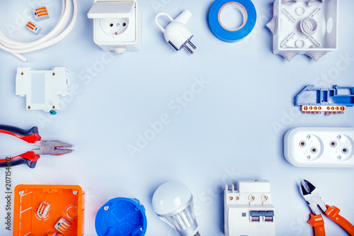 Obraz na plátně Different electrical tools on light grey background with plase for text, top view
