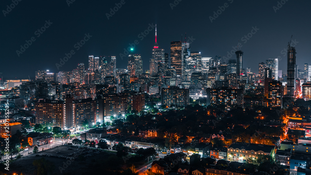 Cars Driving with the Toronto City Skyline