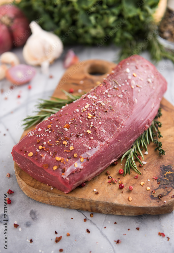 Beef Tenderloin on Wooden cutting Board